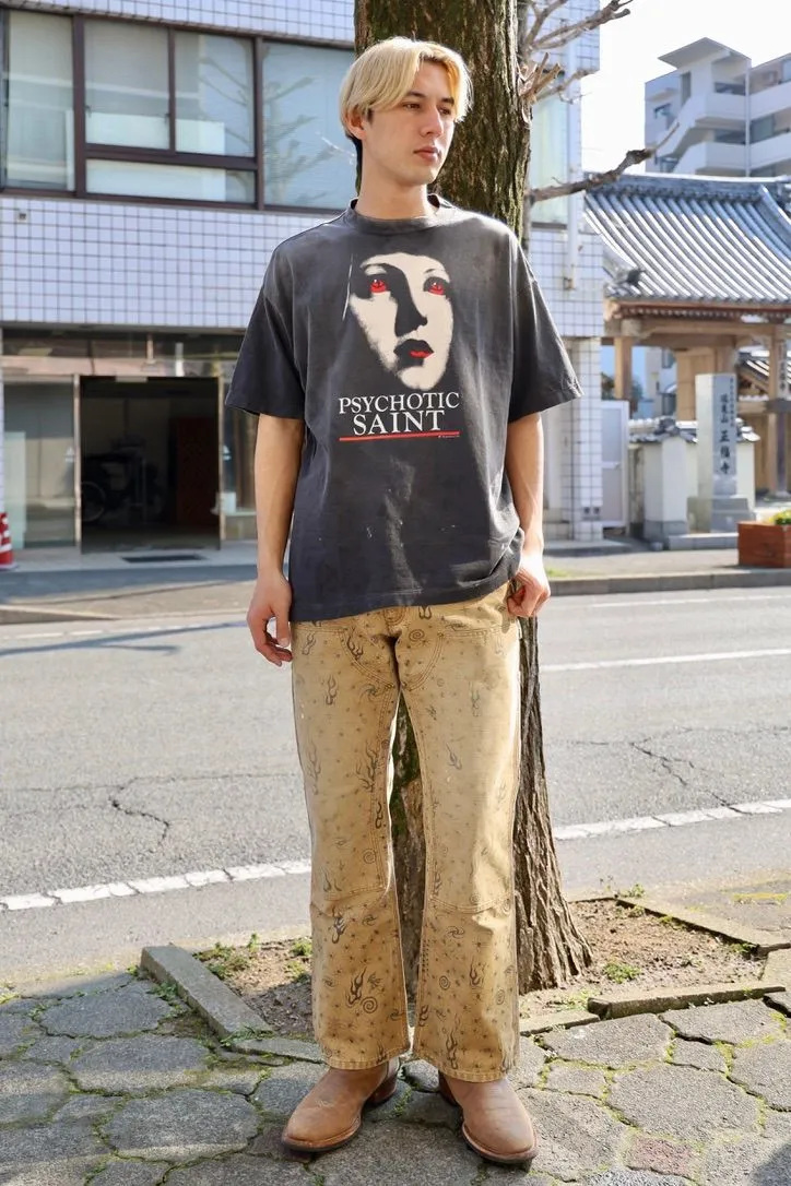 SAINT Mxxxxxx SS TEE/PSYCHOTIC SNT/BLK Gothic heavy metal rock style retro short-sleeved Mysterious woman's face printed distressed TEE Washed black S-XL Same as the original version Cylindrical side seam OE yarn fabric Garment dyeing Faded by heavy washing Bust plaster faded Correct version Matching of original accessories